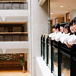 Japanese schoolgirls, on the first floor, overlooking the atrium.